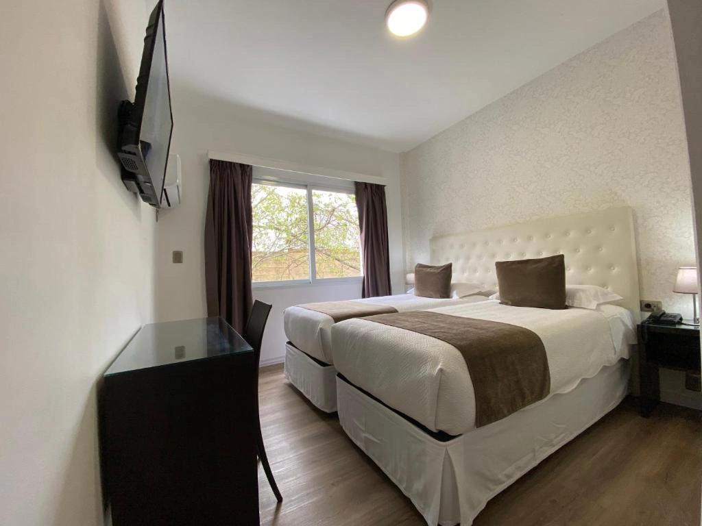 dormitorio_cama_hotel_alvear.webp