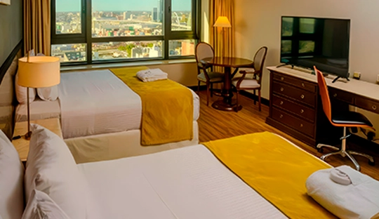 dormitorio_camas_individuales_radisson_montevideo.webp